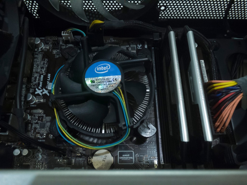 The boxed Intel CPU fan as originally installed.
