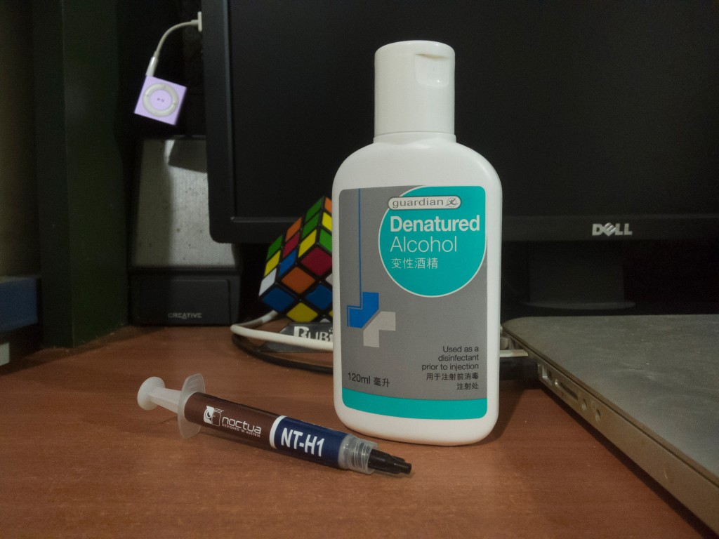 Noctua NT-H1 thermal compound and a bottle of denatured alcohol.